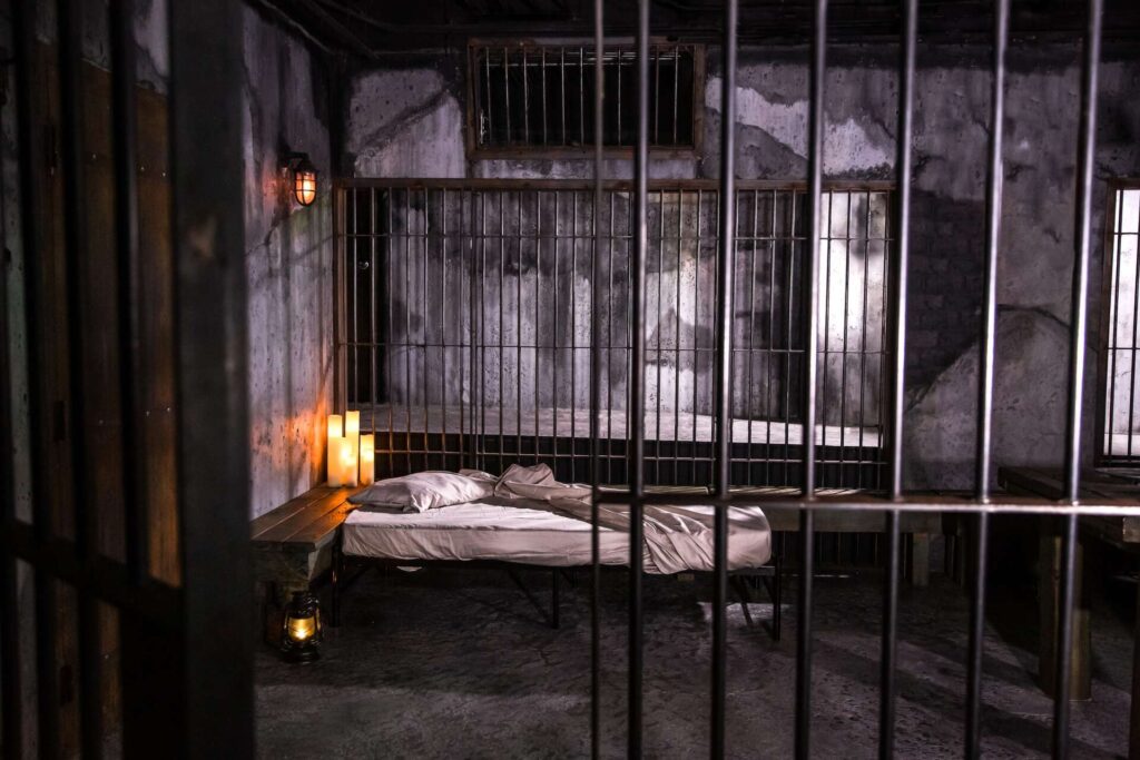 Alcatraz prison cell during a nighttime ghost tour