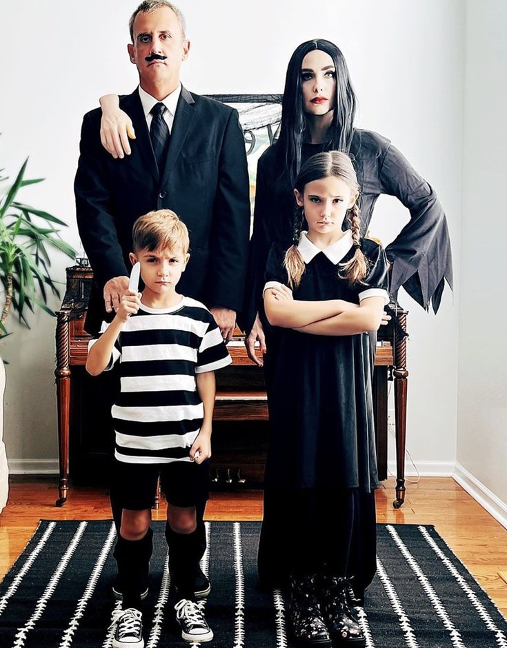 Family in coordinated Halloween costumes shopping in San Francisco