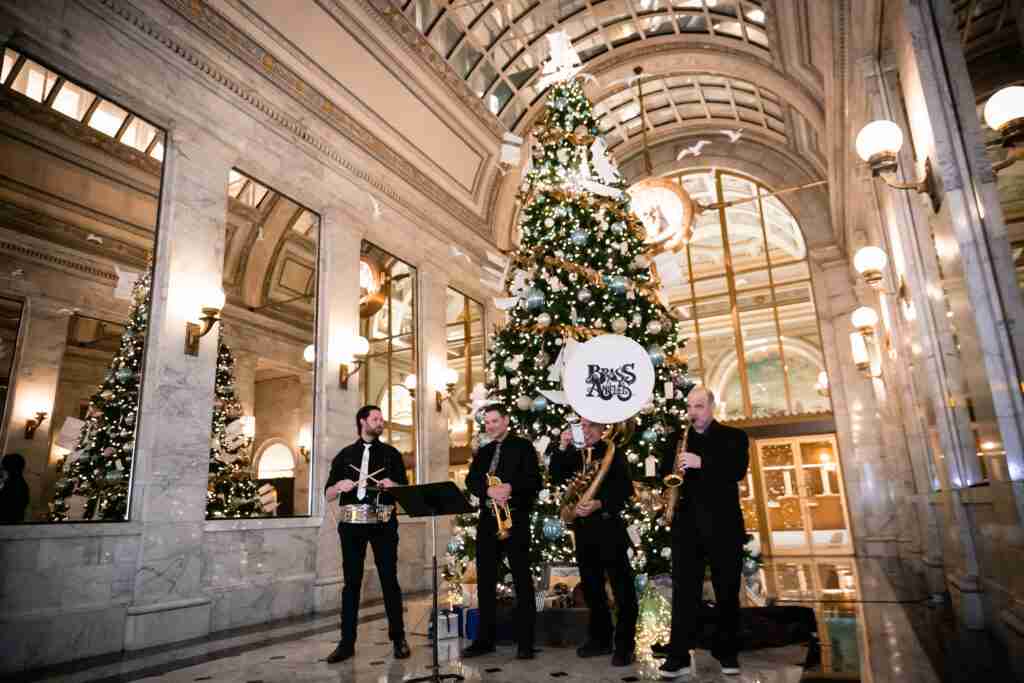 Holiday brass band performing at a San Francisco Christmas market