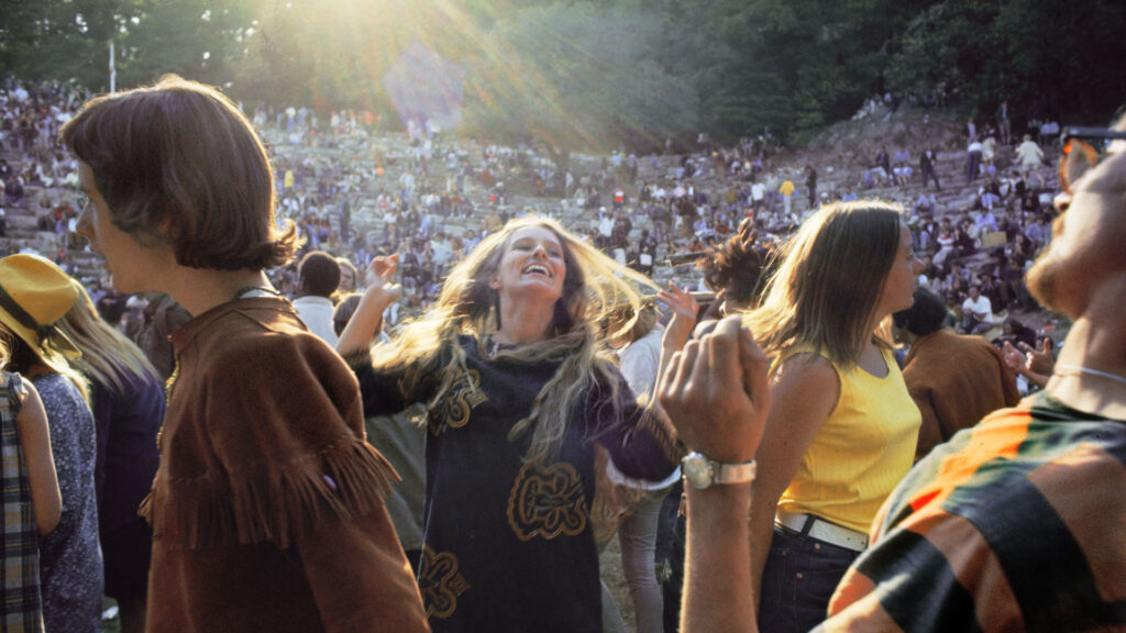 Archival photo of the Summer of Love crowds in Golden Gate Park.