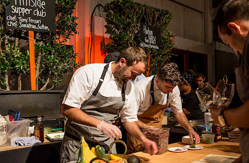 Chef preparing gourmet dish at Eat Drink SF