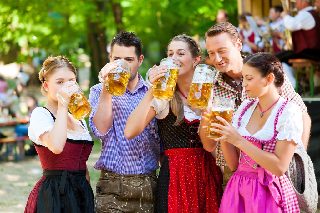 Friends toasting craft beers at Standard Deviant Brewing Oktoberfest