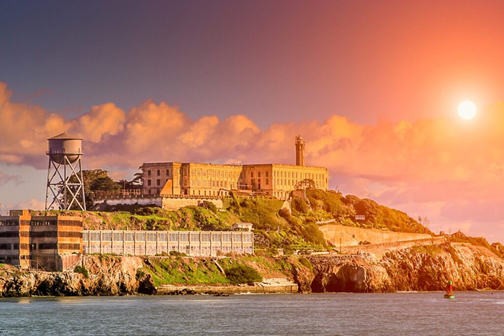 Golden sunset view of Alcatraz Island during Labor Day boat cruises San Francisco