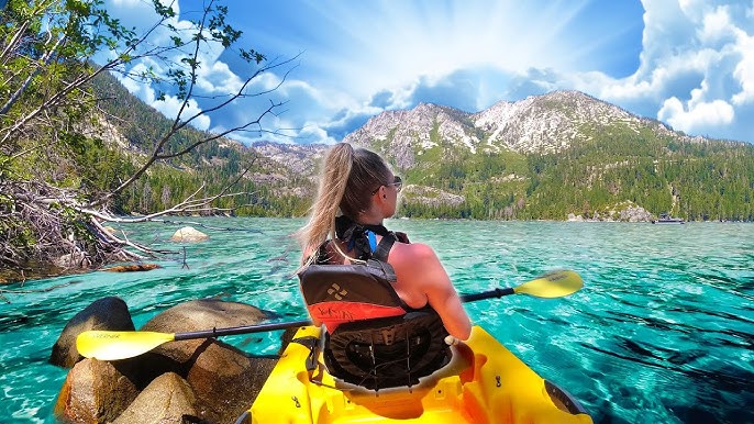Kayakers enjoying Emerald Bay during Labor Day weekend in Northern California