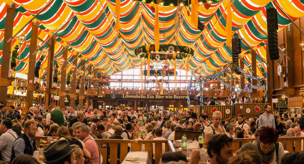Oktoberfest by the Bay at Pier 35 with lively crowds enjoying beer and music.