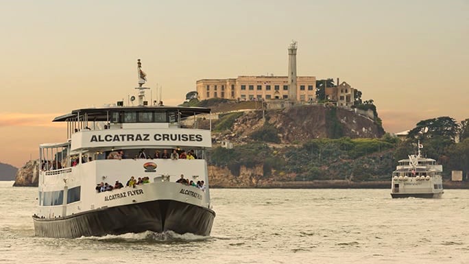 Tourist ferry arriving at Alcatraz Island in September